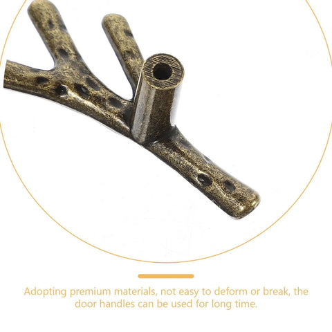 Close-up of a branch shaped cabinet handle in gold finish, part of Branch Shaped Cabinet Handles Four Piece Set Vintage Retro Metal Drawer Knobs For Wardrobe Kitchen Bathroom Cupboard Easy Install Single Hole Mount Classic Furniture Pulls For Cabinets And Doors.