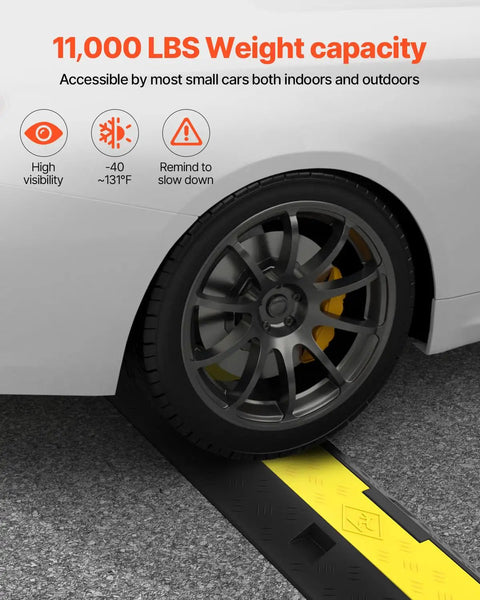 Car wheel on Three Pack 2 Channel Cable Protector Ramp With 11000 Lbs Per Axle Capacity For Driveways, rubber speed bump visible