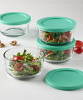 Two Cup Glass Storage Containers With Lids Set Of Four Mint Snugfit Lids Keeps Leftovers Fresh For Meal Prep with salad inside