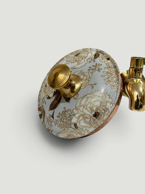 Close-up of lid and tap of Blue Enamel Copper Water Dispenser With Lid And Tap Handmade Indian Pot For Drinking Water Storage