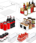 Total Game Changer Clear Plastic Storage Bins Eight Pack Of See Through Pantry Organizers And Fridge Containers with soda and jars.