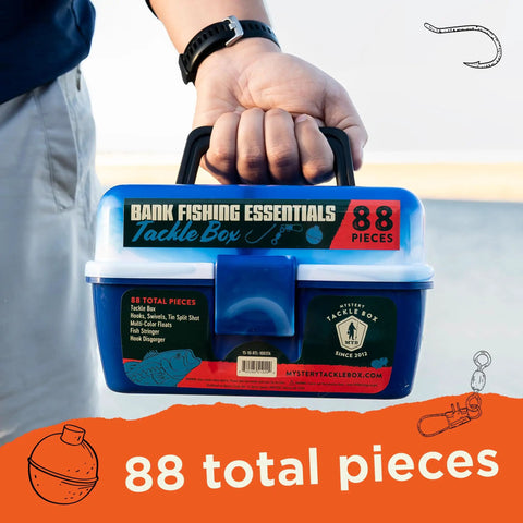 Person holding 88 Piece Bank Fishing Essentials Tackle Box Kit With Hooks Swivels Split Shot Floats Stringer And Disgorger In A Compact Blue Box Perfect Starter Gift For Beginner Anglers