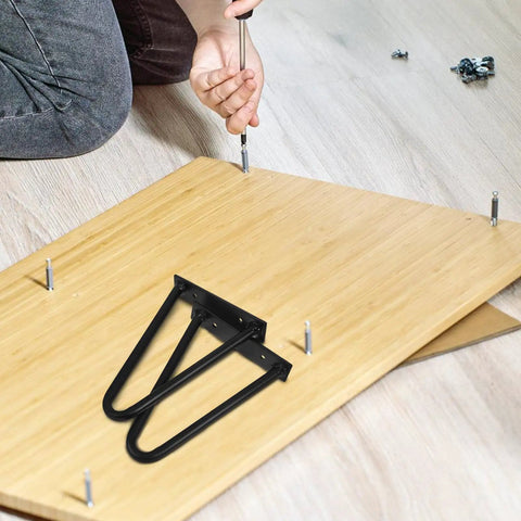 Installing Black Iron Hairpin Table Leg Set, 2 Pack, Heavy Duty Easy Install Metal Furniture Legs on wooden table top.