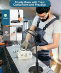 Man using Go-To Hands Free Magnifier Lamp With Gooseneck Stand And LED Light in a workshop, focusing on detailed work.