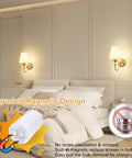 Battery Operated Wall Sconces Set of 2,Rechargeable Wireless Wall Sconces with 10000mAh RGB Dimmable Bulb and Remote,15 Colors Cordless Wall Lights for Bedroom,Bathroom,Living Room & Hallway(Gold) with magnetic bulb design in bedroom setting.