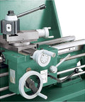 Close-up of 12 Inch By 36 Inch Gear Head Wood Lathe With Cam Lock Spindle and Gap Bed, featuring lever controls and speed settings.