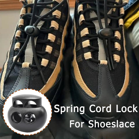 Ten Pack BabyPink Plastic Bungee Cord Locks with black spring cord lock on shoes for secure lacing and adjustments.