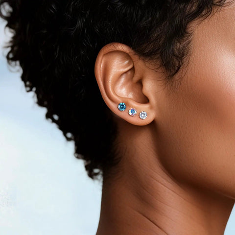 Skip The Itch With These Implant Grade G23 Titanium Screw Back Earrings Featuring Hypoallergenic Design And F136 Certified For Totally Sensitive Tolerant Ears While Delivering Premium Nickel Free Security And Long Lasting Wear Without Any Drama Or Redness. Close-up of titanium screw back earrings in ear with aqua and clear CZ stones.
