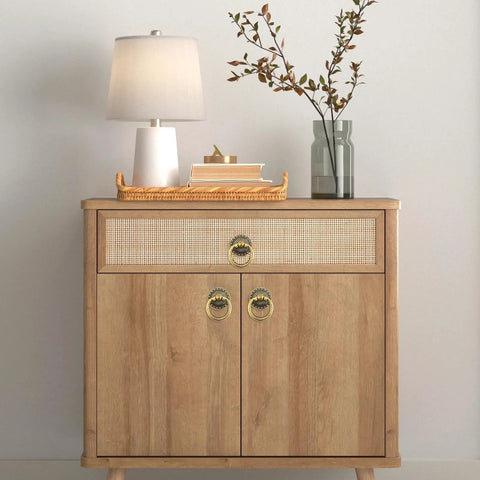 Wooden cabinet with set of 6 vintage bronze drop ring knobs for dresser drawers and cabinets, installed, showing antique single hole design.
