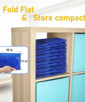 8 Pack Extra Large Moving Bags With Zippers And Carrying Handles, stacked flat in a cube organizer, blue color.