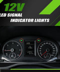 Car dashboard with 12V LED turn signal indicators, green arrows illuminated, 2 pack waterproof panel mount lights for car dash use.