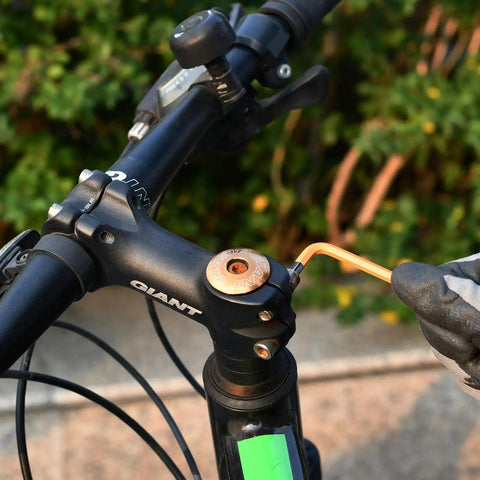 Using Premium 18 Piece Allen Wrench Set With SAE And Metric Hex Keys on bicycle stem, showcasing chrome vanadium steel, long arm ball end.