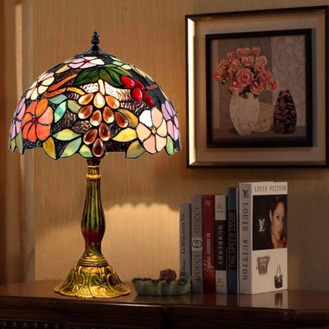 Tiffany Style Grape Rose Dope Stained Glass Table Lamp Handcrafted For Bedroom Living Room And Home Office Desk Decor With LED E26 Bulb Included 12x12x18 Inches on wooden table.