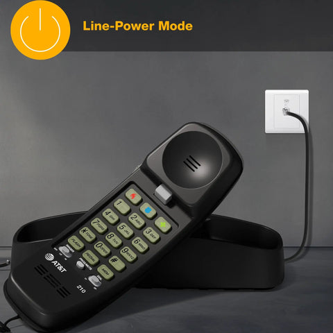 Straight Up Reliable Trimline Corded Landline Phone Works Like A Dream With Bright Backlit Keypad on a desk with the line connection.