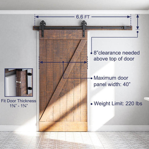 Beefed Up Heavy Duty Sliding Barn Door Hardware Kit Black Steel Track System installed on wood door, supports up to 220 lb, fits 36-40 in doors