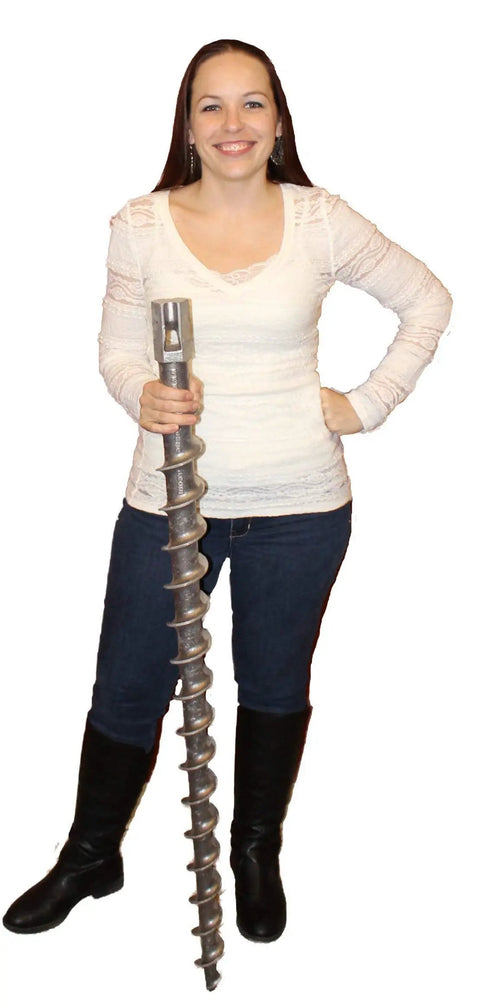 Person holding 46 Inch Aluminum Screw Ground Anchor With 1/2 Inch Guying Slot, Heavy Duty Beast That Holds Up To 14,000 Lbs
