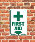 Heavy Duty Aluminum First Aid Sign 8x12 Inch Weatherproof And Rust Resistant Pre Drilled For Easy Mounting Ideal For Workplace School Hospital Factory Warehouse And Outdoor Use mounted on brick wall