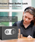 Girl using Compact Digital Home Safe With Keypad And Emergency Key, Mini 0.3 Cu Ft Stash Box for cash, jewelry, coins under desk or closet.