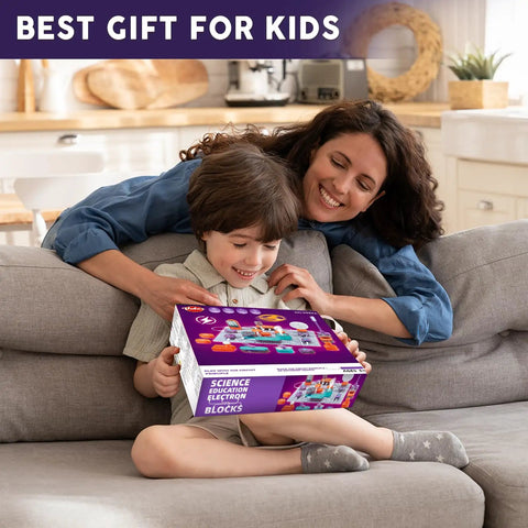 Mother and son with Science Circuit Kit For Kids With 53 Pieces And 150 Plus Projects, Hands On Electronics Exploration Set.