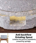 Close-up of grind spout on Rock Solid Manual Granite Stone Grain Mill With Wooden Base And Hand Crank Heavy Duty Grinder For Home Use