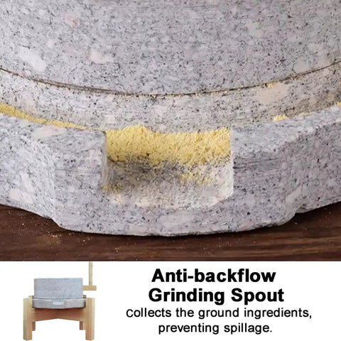 Close-up of grind spout on Rock Solid Manual Granite Stone Grain Mill With Wooden Base And Hand Crank Heavy Duty Grinder For Home Use