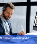 Man using Wireless Headset With Microphone For PC And Phone, V5.2 Noise Cancelling Mic during online meeting at desk