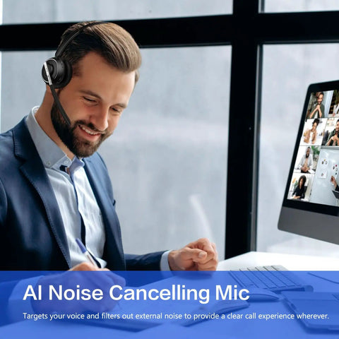 Man using Wireless Headset With Microphone For PC And Phone, V5.2 Noise Cancelling Mic during online meeting at desk