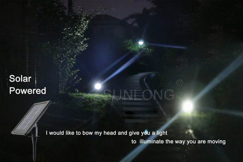 Solar Powered Outdoor Spotlight 2 In 1 Bright Solar Spotlights illuminating a garden path at night with adjustable brightness.