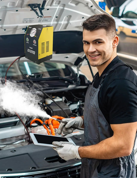 Solary DC12V automotive smoke tester hanging above engine bay; yellow and black unit with gauge.