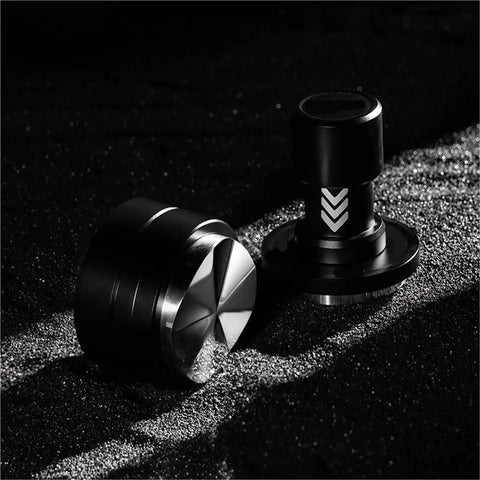 Straight Fire Dual Bearing Espresso Distributor And Tamper Combo Fits 51 54 58mm Filter Baskets Handheld coffee ground leveler tool close-up on black background.