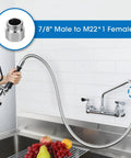 Built Different Commercial Sink Sprayer With 45 Inch Flexible Stainless Pre Rinse Hose and Heavy Duty Overhead Spring Replacement Kit in use over fruits.