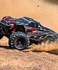 Widemaxx Red Ready To Rip RC Monster Truck With Clipless Body Mount System Delivers 55 Plus MPH Straight From The Box On A 4S LiPo kicking up dirt