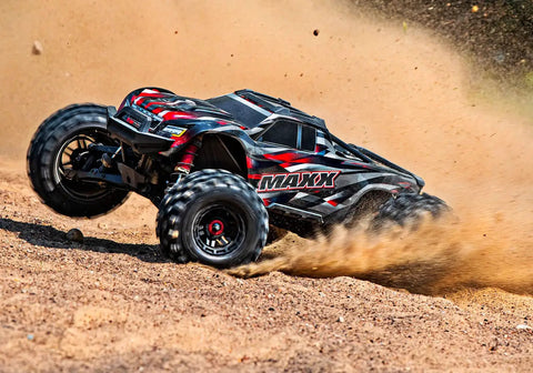 Widemaxx Red Ready To Rip RC Monster Truck With Clipless Body Mount System Delivers 55 Plus MPH Straight From The Box On A 4S LiPo kicking up dirt