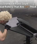 Worker using Heavy Duty Bead Roller Table With Sturdy Tube Frame For Metal Fabrication 36.25 Inch Long 19.5 Inch Wide At Widest 5 Inch Narrowest