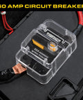 Hella Heavy Duty Built Rugged 60Amp Marine Circuit Breaker With Waterproof Sealed Cover Battery Disconnect Switch Inline Fuse Protector For Solar Boat Trolling Motor Systems installed on a battery.