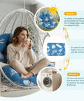 Woman sitting on waterproof outdoor egg chair cushion replacement with ties for hanging egg couch, blue leaf, 47x35x7 inches.