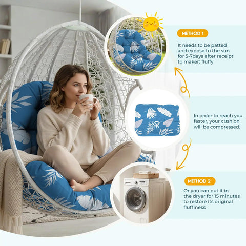 Woman sitting on waterproof outdoor egg chair cushion replacement with ties for hanging egg couch, blue leaf, 47x35x7 inches.