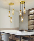 Three Light Crystal Pendant Light Fixture With Bulbs Included Brushed Brass Island Pendant For Kitchen 60-Inch Adjustable Cord Cool Sleek Modern Lighting Easy Installation over dining table