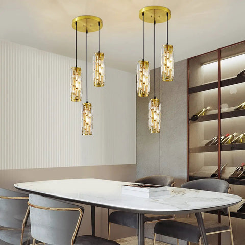 Three Light Crystal Pendant Light Fixture With Bulbs Included Brushed Brass Island Pendant For Kitchen 60-Inch Adjustable Cord Cool Sleek Modern Lighting Easy Installation over dining table