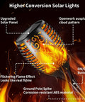 Outdoor Solar Torch Lights With Dancing Flame 99 LED 43 Inch Waterproof showing flickering flame effect and solar panel.