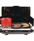 2-In-1 Tabletop Camping Grill And Stove With Two Burners, 20,000 BTUs, adjustable burners, grilling meat, red pot on stove