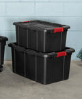 Heavy Duty Plastic Storage Totes With Secure Snap Lids For Garage Shed Organization 15 Gallon 18 Pack stackable black bins in garage.