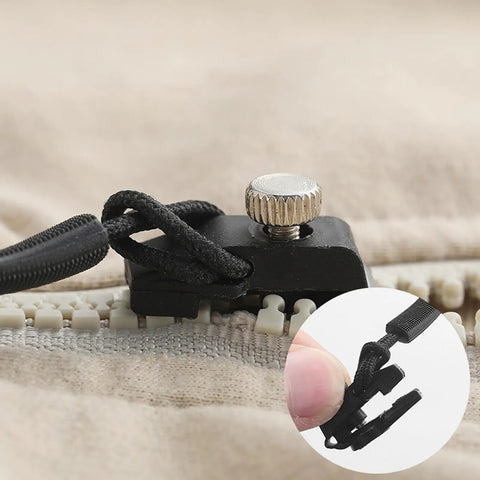 Close-up of zipper slider repair using Zipper Repair Kit 3 Piece Universal Puller Tool Set For Jackets Boots Luggage And Backpacks Quick Zip Slider Replacement For Sewing Travel And Outdoor Gear Repair No Sweat DIY.
