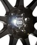 Front close-up of 17x7 Enkei EDR9 matte black wheel, center cap with Enkei logo and lug hole pattern