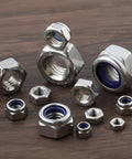 206 Piece Metric Lock Nuts And Hex Nuts Assortment Kit Nylon Insert Nylock 304 Stainless Steel M3 To M10 displayed on wood surface