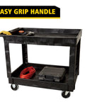 Two Shelf Utility Cart With Lipped Shelves And Standard Handle Heavy Duty 500 Lb Capacity For Jobsite Shop Floor Warehouse Garage Cleaning And Maintenance Lightweight Quiet Operation Molded In Handle With Storage Compartments And 4 Inch Non Marking featuring easy grip handle, black color, top shelf with tools and bottom shelf with cord, 4-inch casters