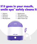 Ultra Deep Clean Ultrasonic And UV Dental Appliance Cleaner For Aligners, Retainers, Dentures, Mouthguards, Toothbrush Heads And More With Dual Cleaning Tech For A Fresh, Odor Free Smile. White and purple countertop cleaner with brush and water flosser tip.