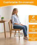 Woman seated on chair with Thirty Six Pack Chair Leg Floor Protectors For Hardwood Floors, illustrated features: floor protection, noise reduction.