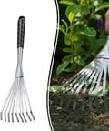 Hand Rake 16.5 Inches For Tight Spots And Flower Beds With 9 Flat Tines shown on a white background and in use in garden soil