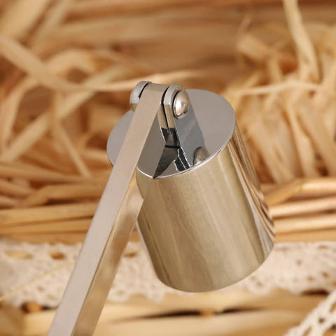 Close-up of Bad Boy Stainless Steel Candle Snuffer With Super Long Handle and Slick Silver Plating in a decorative setting.